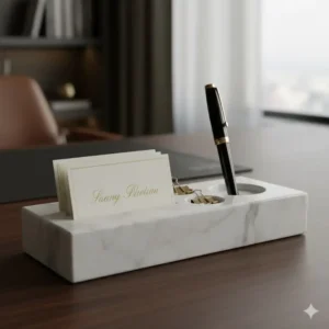 Modern, minimalist executive desk organizer made from solid marble, holding business cards and other **luxury office supplies**.