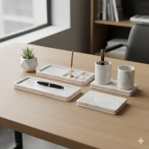 Overhead view of a sleek, minimalist luxury desk organizer in a white marble finish, showing clean lines and thoughtful design.
