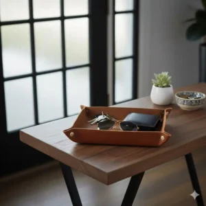 Diagram showing a wooden mens catch all tray placed by the front door, ideal for immediately dropping keys, wallet, and sunglasses upon arriving home.