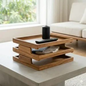 Small wooden stackable trays used as decorative catch-alls for remotes and candles on a coffee table.