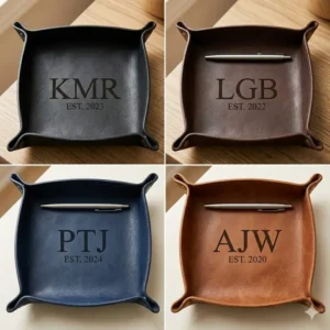 A collection of personalized valet tray options in various colors including black, brown, and navy blue leather.